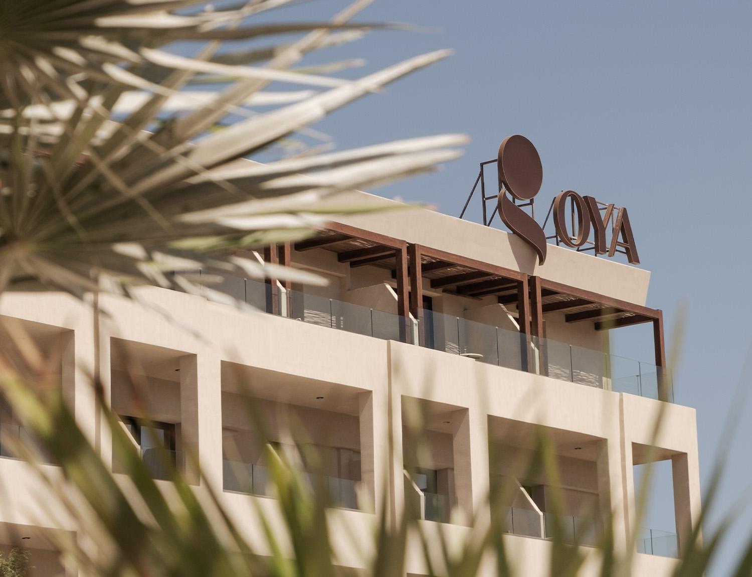 oya-beach-resort-surroundings-resort-rooftop-sign-palms-73 spa